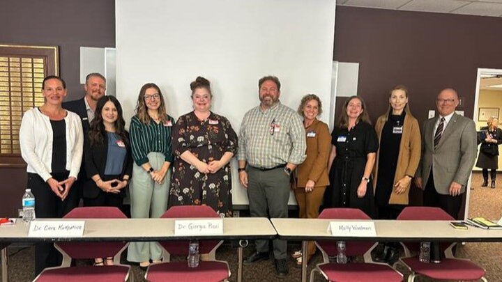 a group photo at the Family Impact Seminar, "The Impact on Social Media Development" 